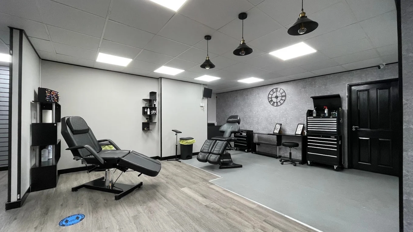 Inside STATTOOS on Regent Street — the studio floor and chairs